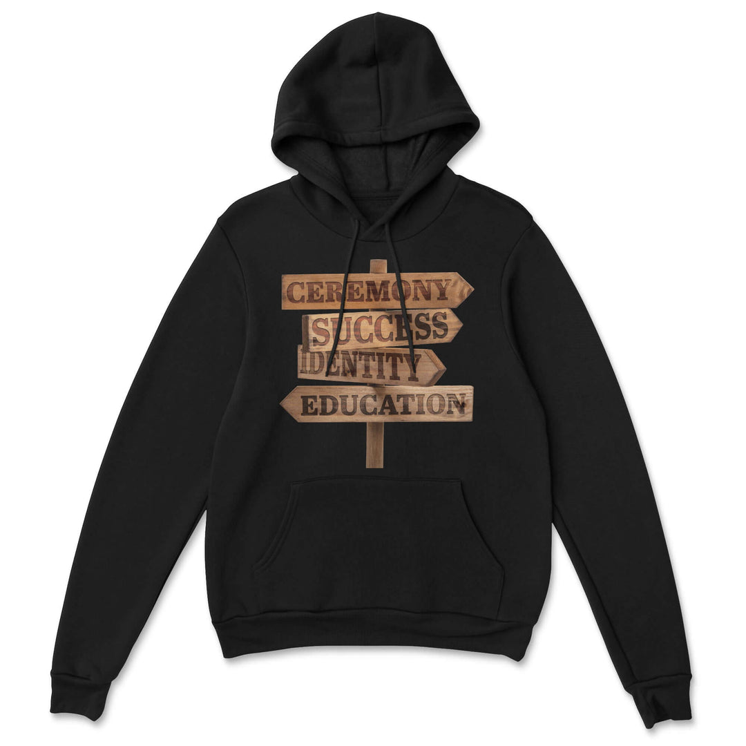 Red Road Hoodie – Indigenous streetwear shirt featuring a wooden signpost with the words Ceremony, Success, Identity, and Education.